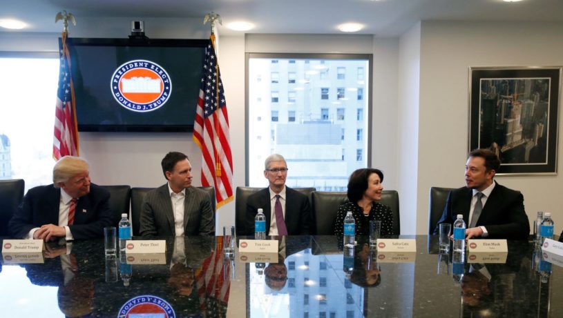 U.S. President-elect Donald Trump sits with PayPal co-founder and Facebook board member Peter Thiel, Apple Inc CEO Tim Cook, Oracle CEO Safra Catz and Tesla Chief Executive Elon Musk during a meeting with technology leaders at Trump Tower in New York