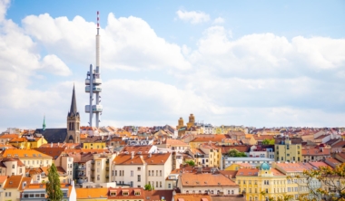 Prague, Czech Republic – 6.05.2019: View from the top of the Vitkov Memorial on the Prague landscape on a sunny day with the famous Zizkov TV tower on the horizon