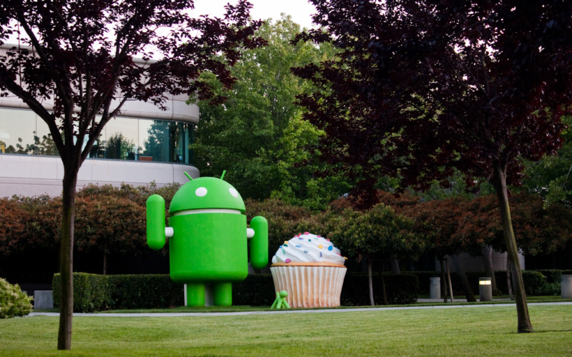 Giant Google Android statue with puppy and cupcake