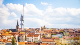 Prague, Czech Republic – 6.05.2019: View from the top of the Vitkov Memorial on the Prague landscape on a sunny day with the famous Zizkov TV tower on the horizon