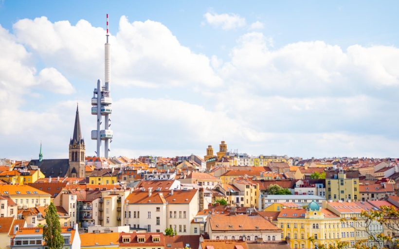 Prague, Czech Republic – 6.05.2019: View from the top of the Vitkov Memorial on the Prague landscape on a sunny day with the famous Zizkov TV tower on the horizon