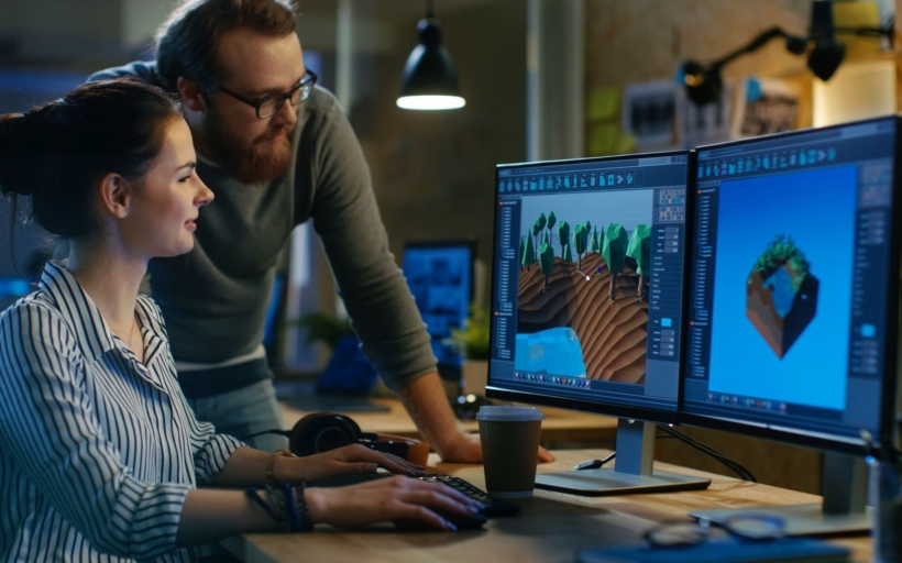 Female Game Developer Has Discussion with Male Project Manager W